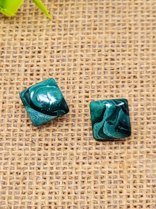 Dark green swirl studs