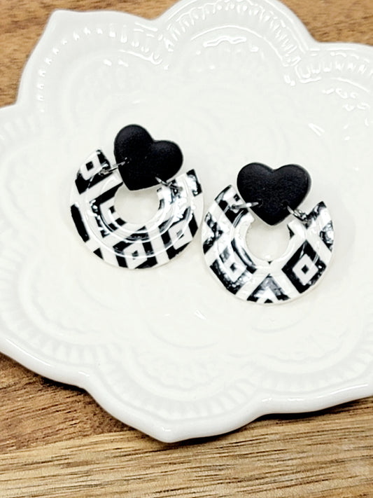 White & black heart dangles