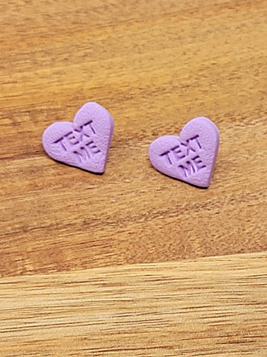 Purple conversation hearts studs - text me