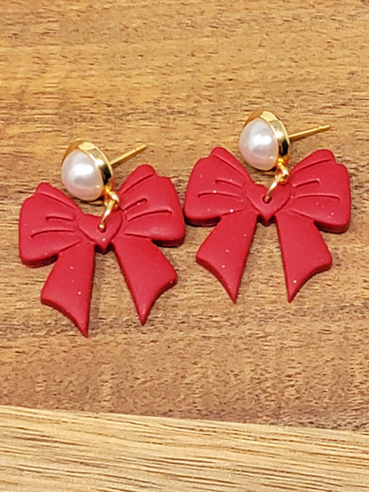 Red bow with pearl top