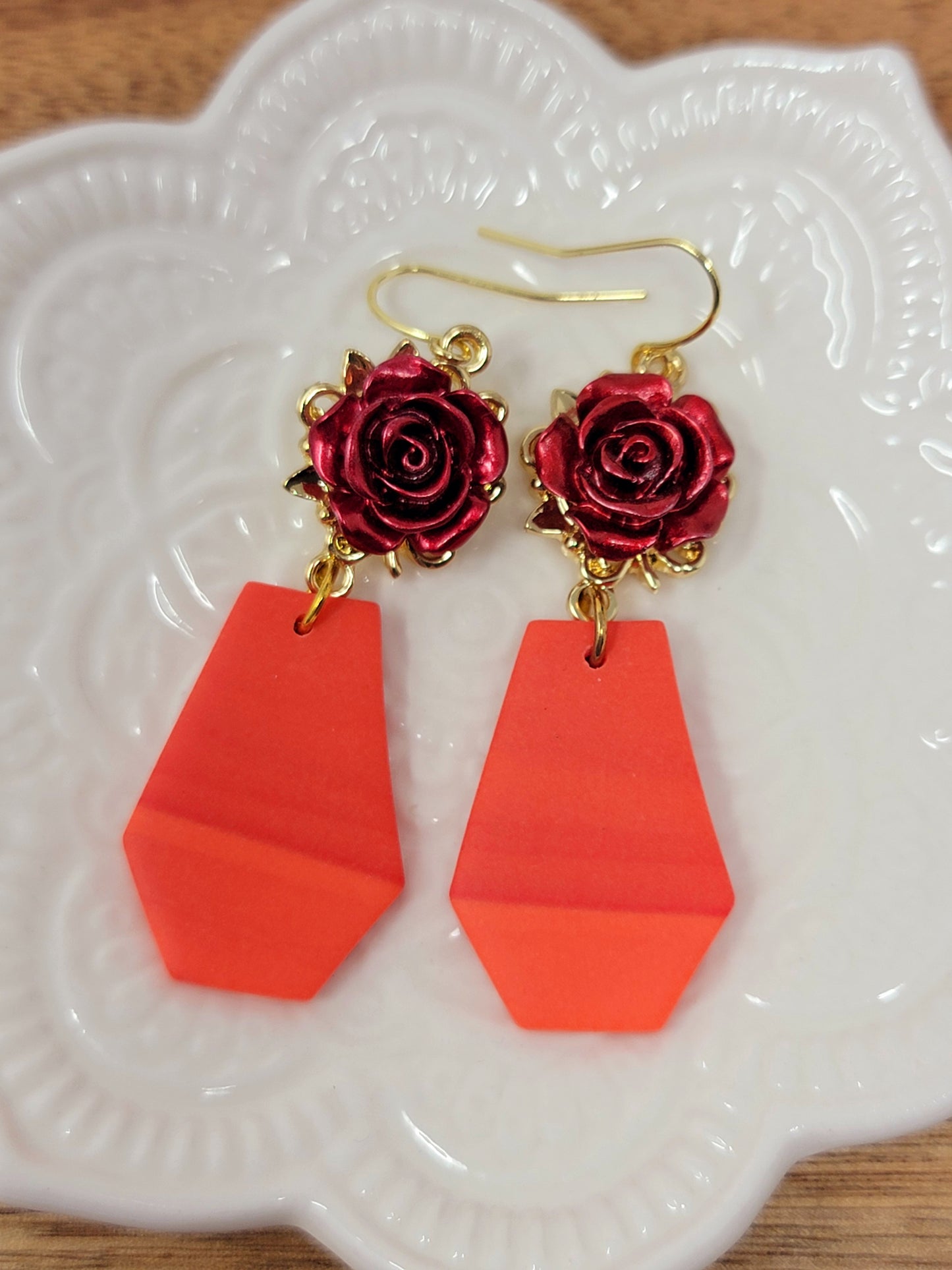 Bright coral dangles with rose top