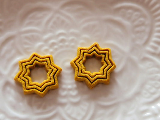 Mustard 8 point star studs