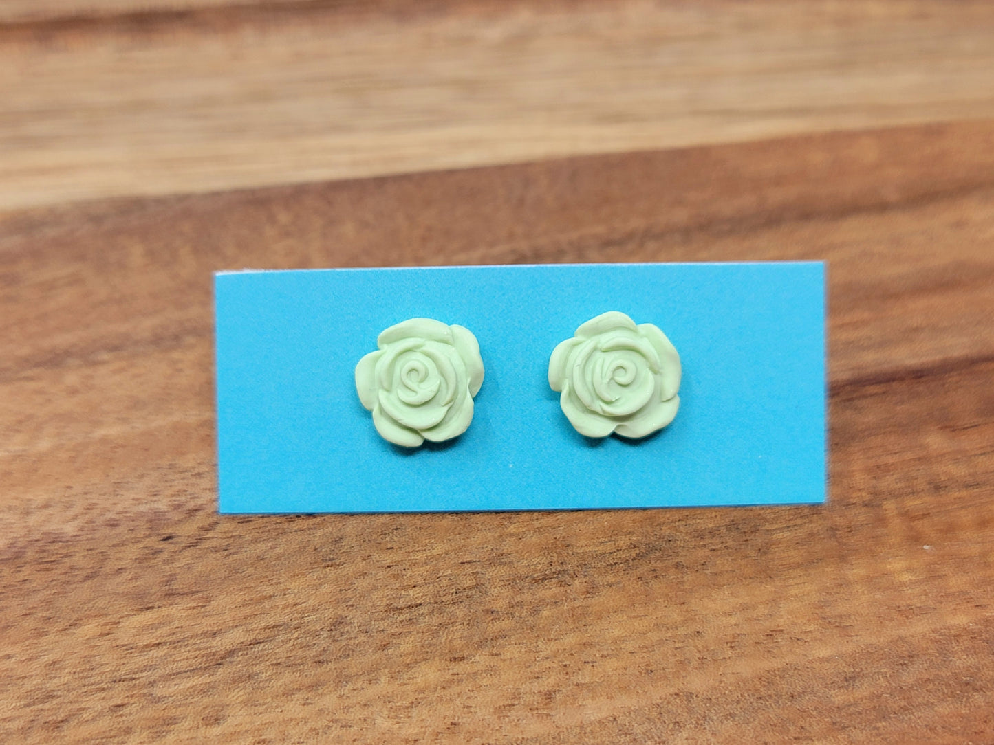 Light mint green rose studs