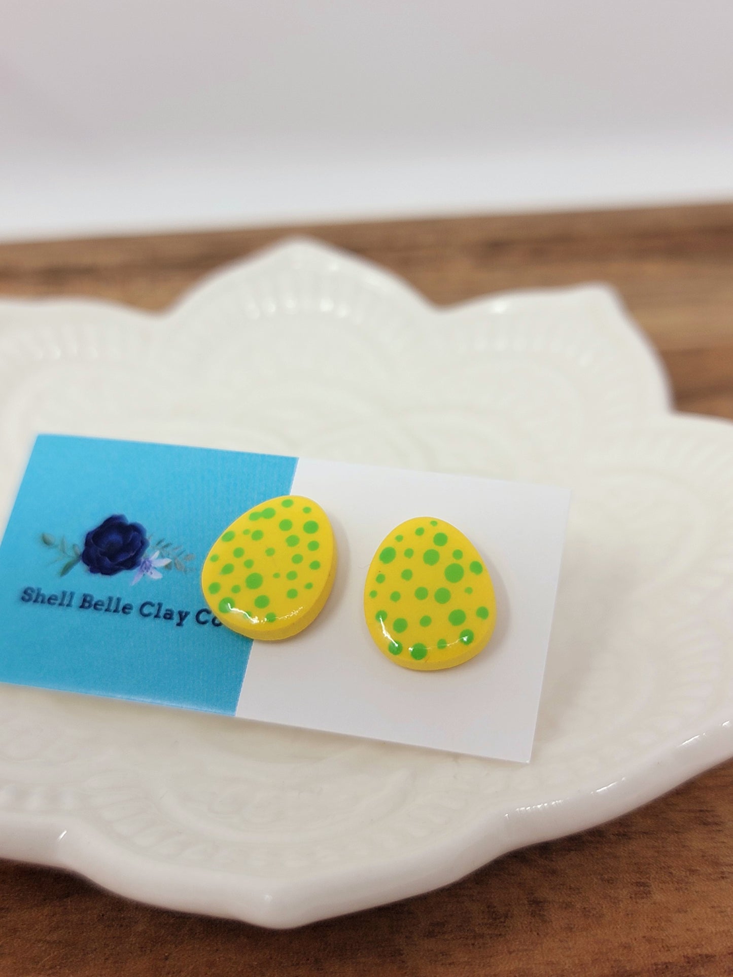 Green speckled yellow easter egg studs