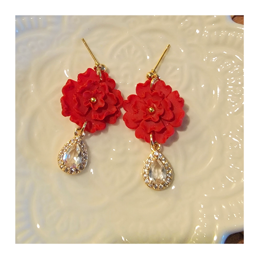 Red hand shaped flower dangles