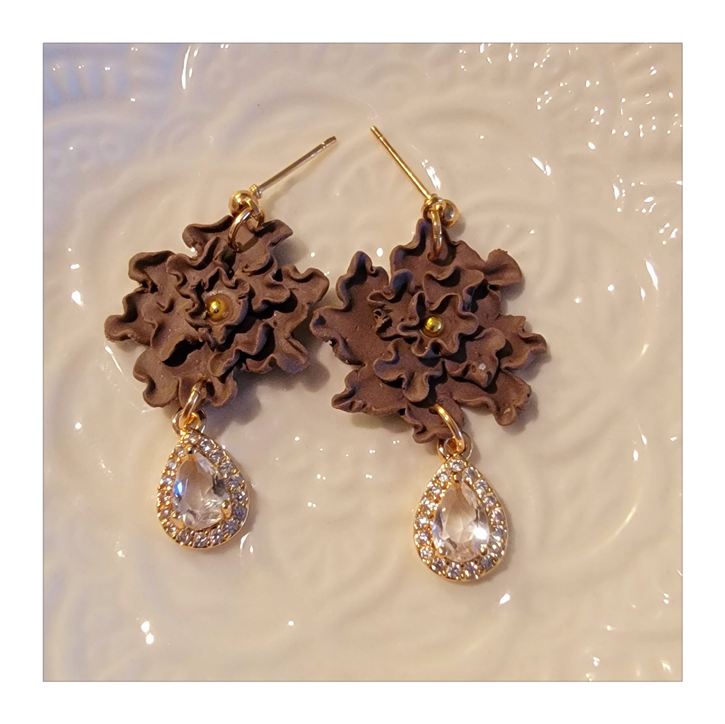 Brown hand shaped flower dangles