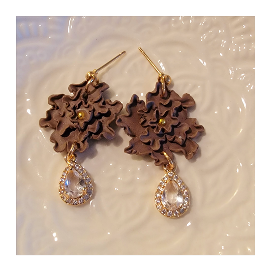 Brown hand shaped flower dangles