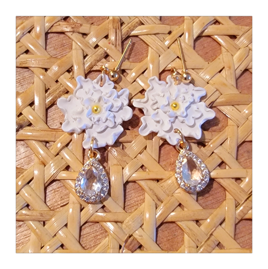 White hand shaped flower dangles