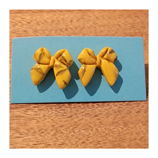 Yellow bow studs with lemon tree pattern