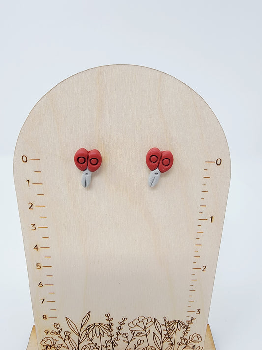 Red scissor studs