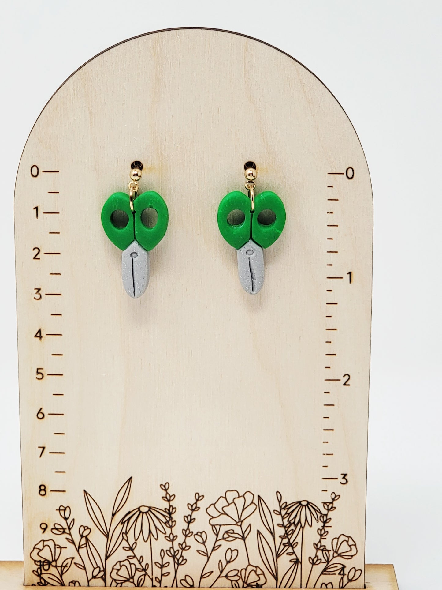 Green scissor dangles