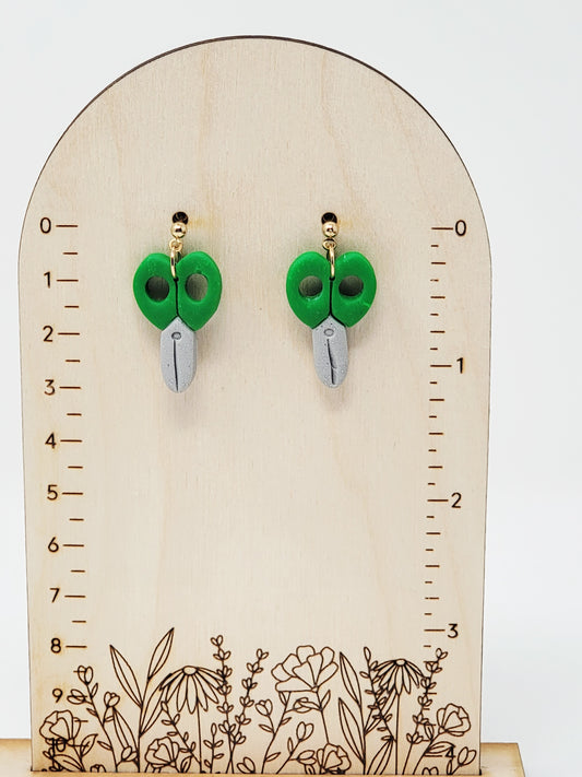 Green scissor dangles