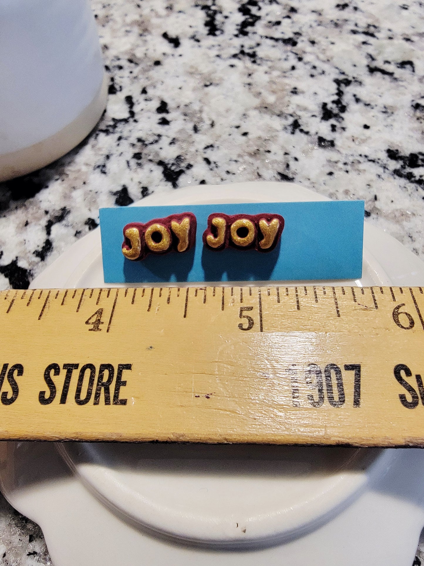 Red joy studs
