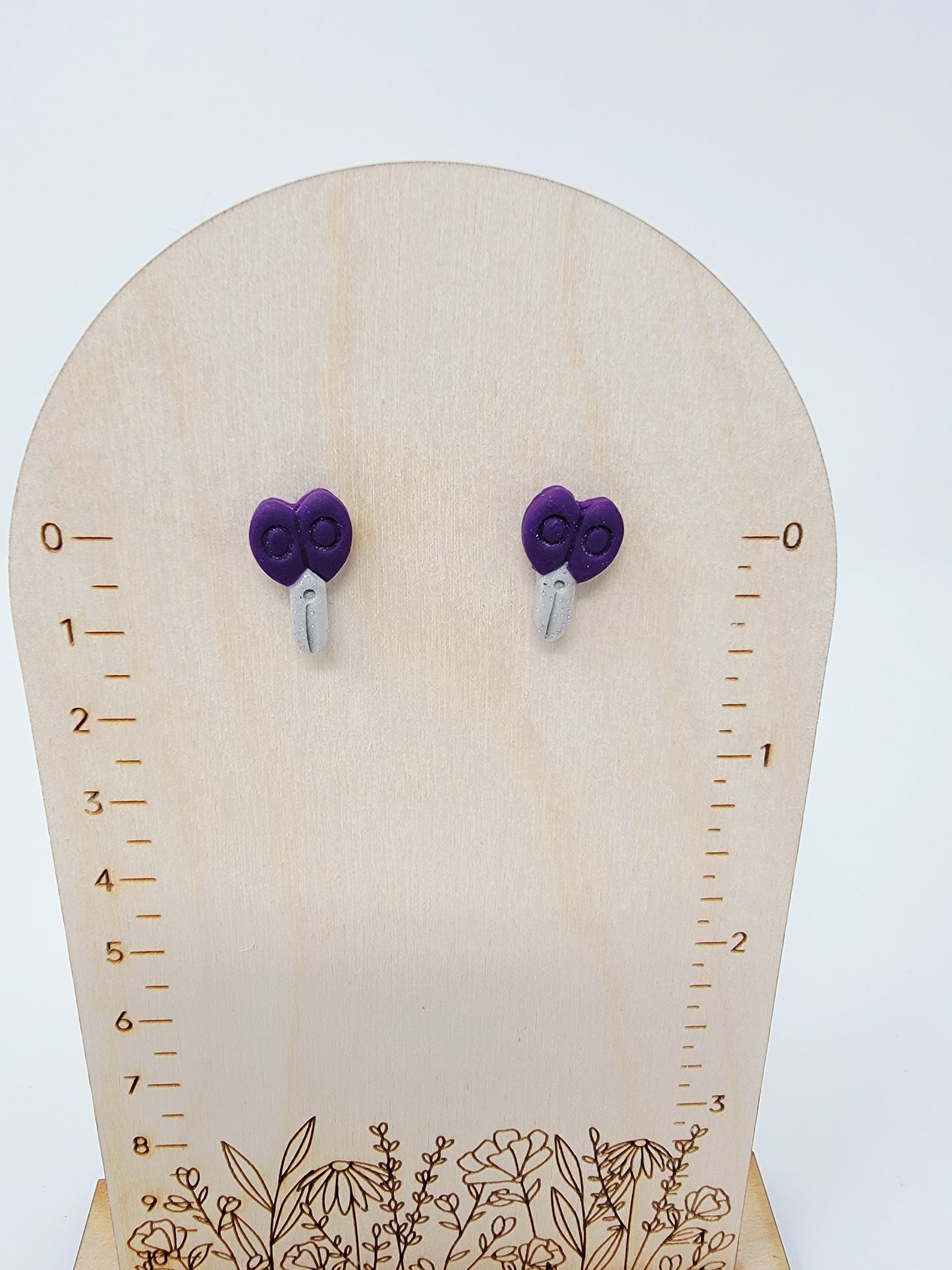 Purple scissor studs