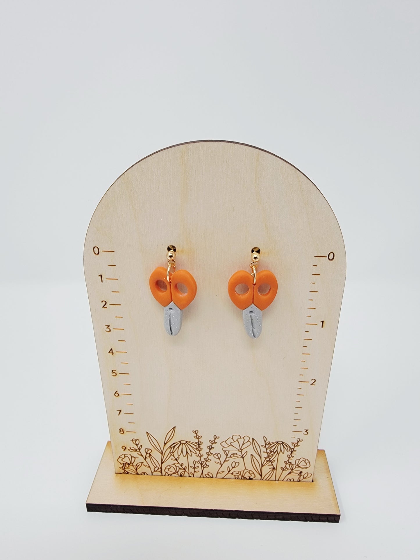 Orange scissor dangles