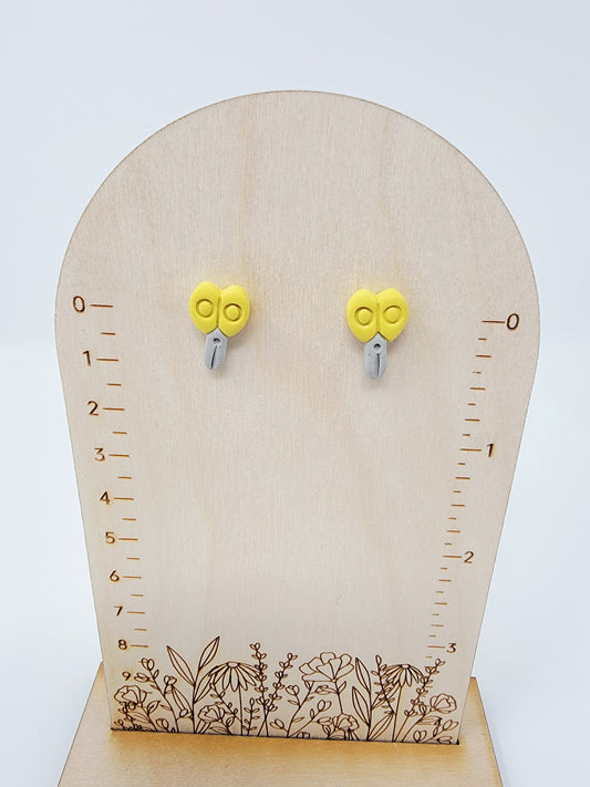 Yellow scissor studs