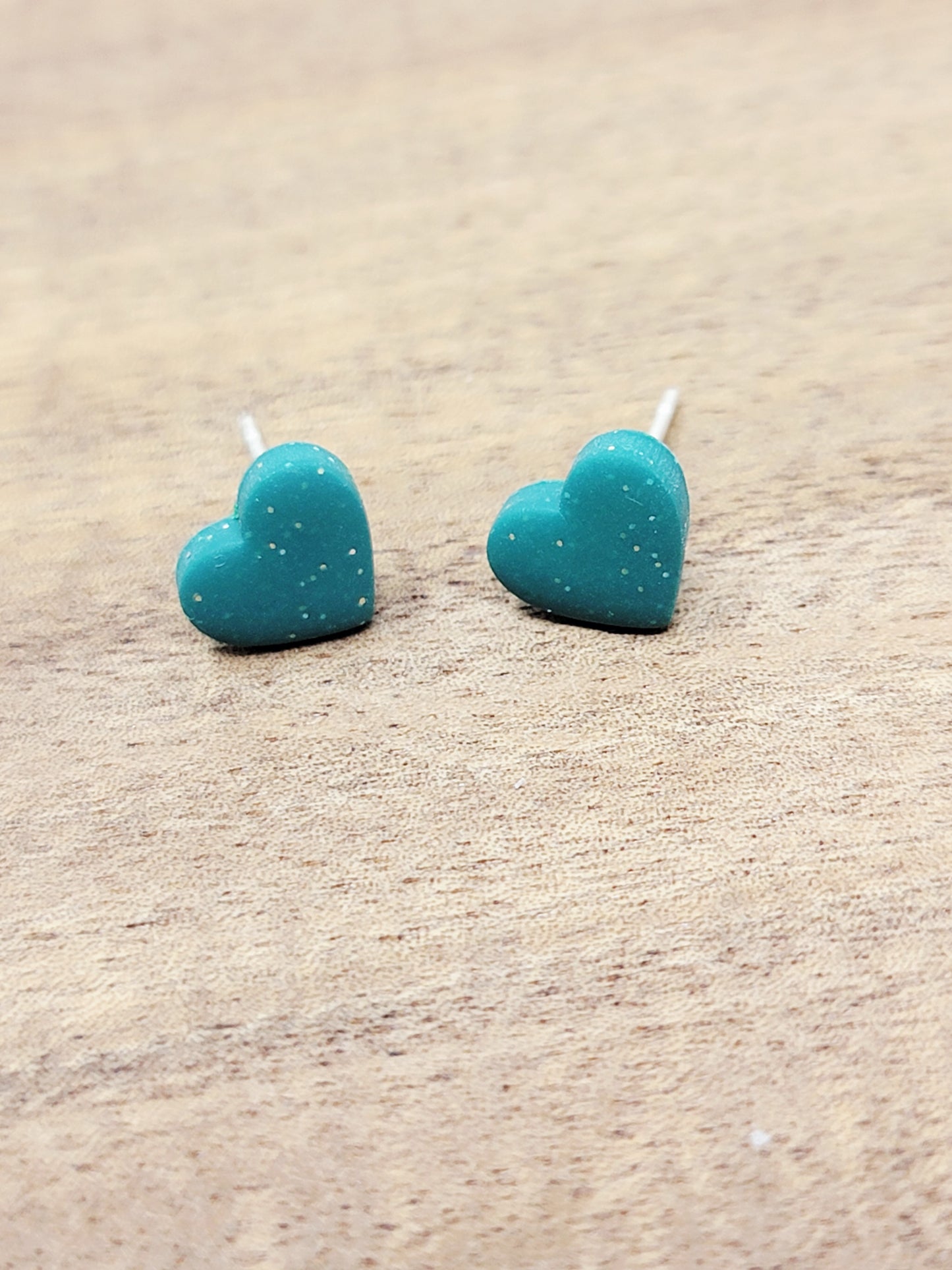 Dark teal mini heart studs