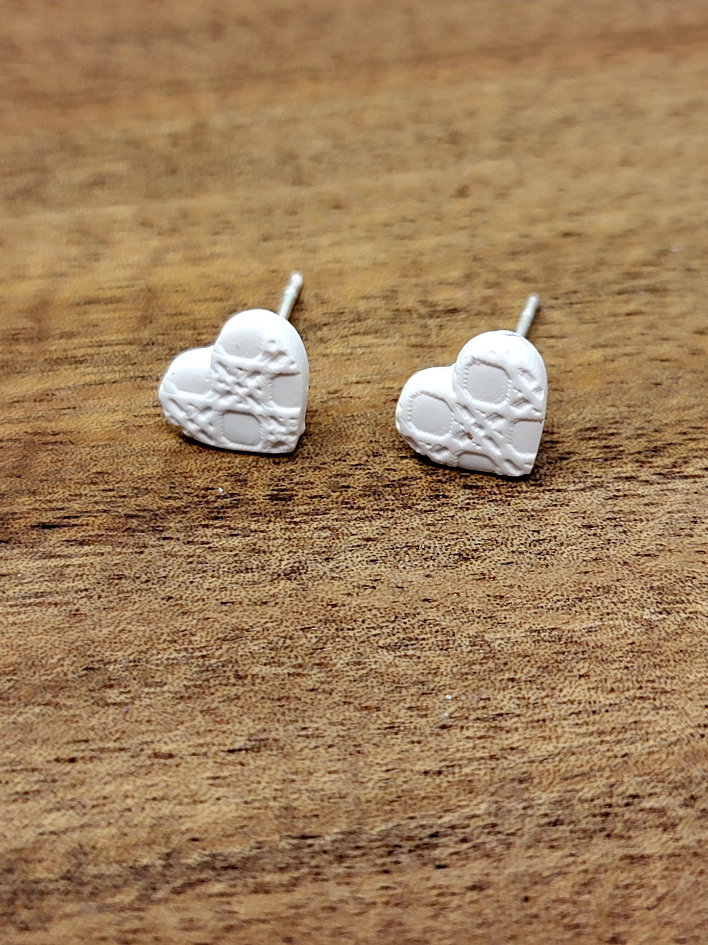 White micro heart studs