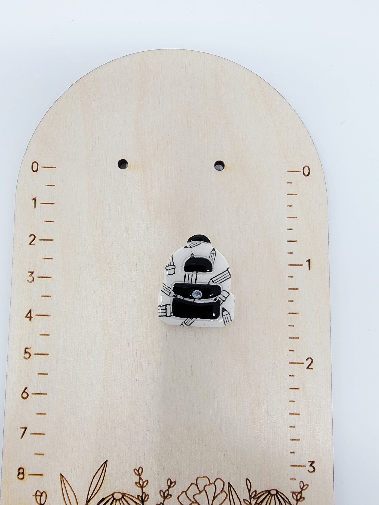 Black & white pencil backpack magnet