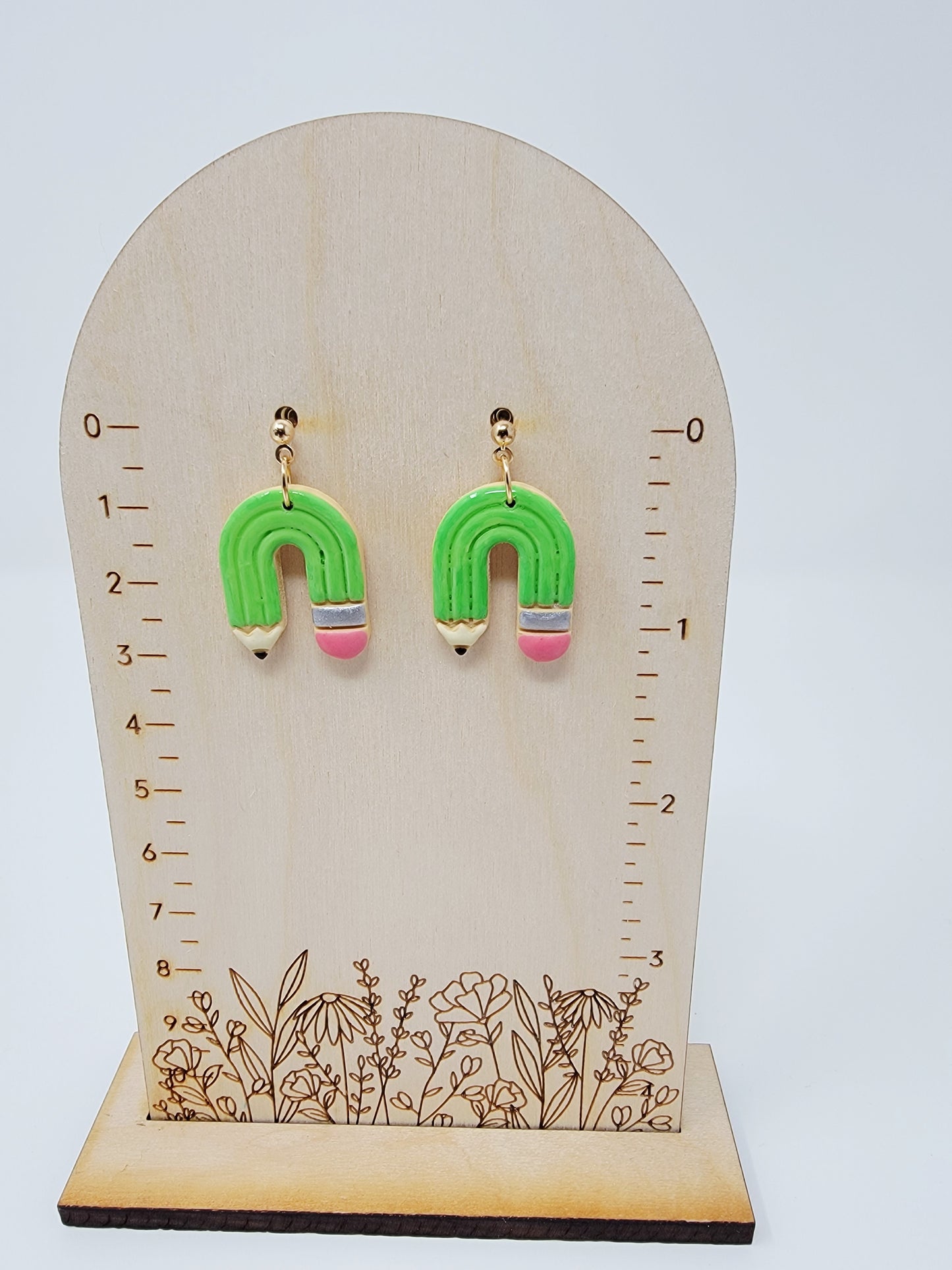 Green pencil dangles