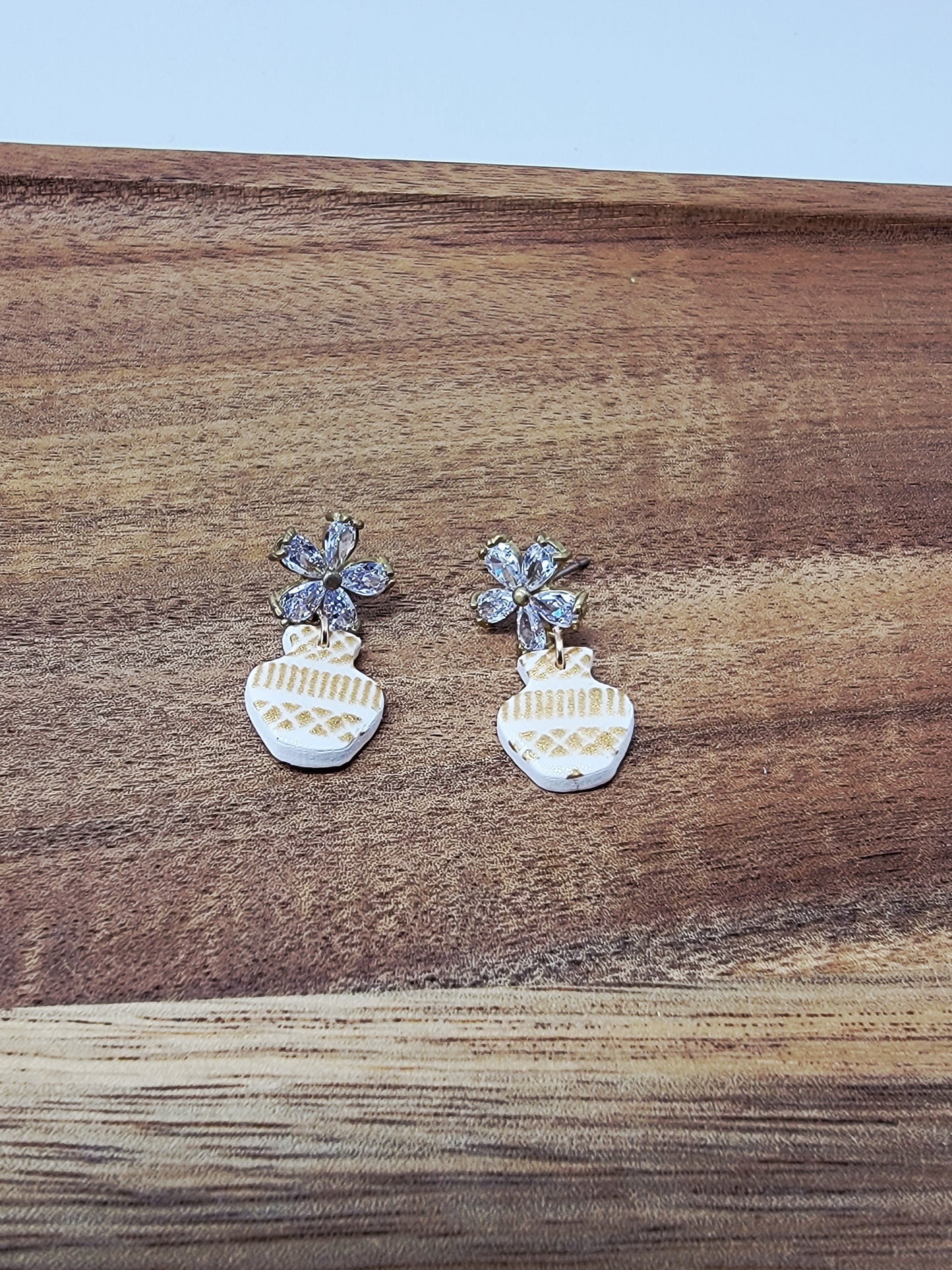 Cubic zirconium flower with white & gold vase dangles