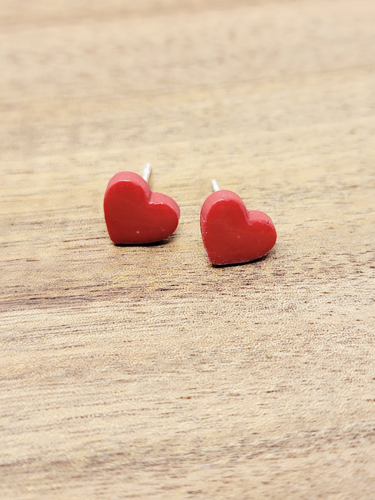 Red micro hearts studs