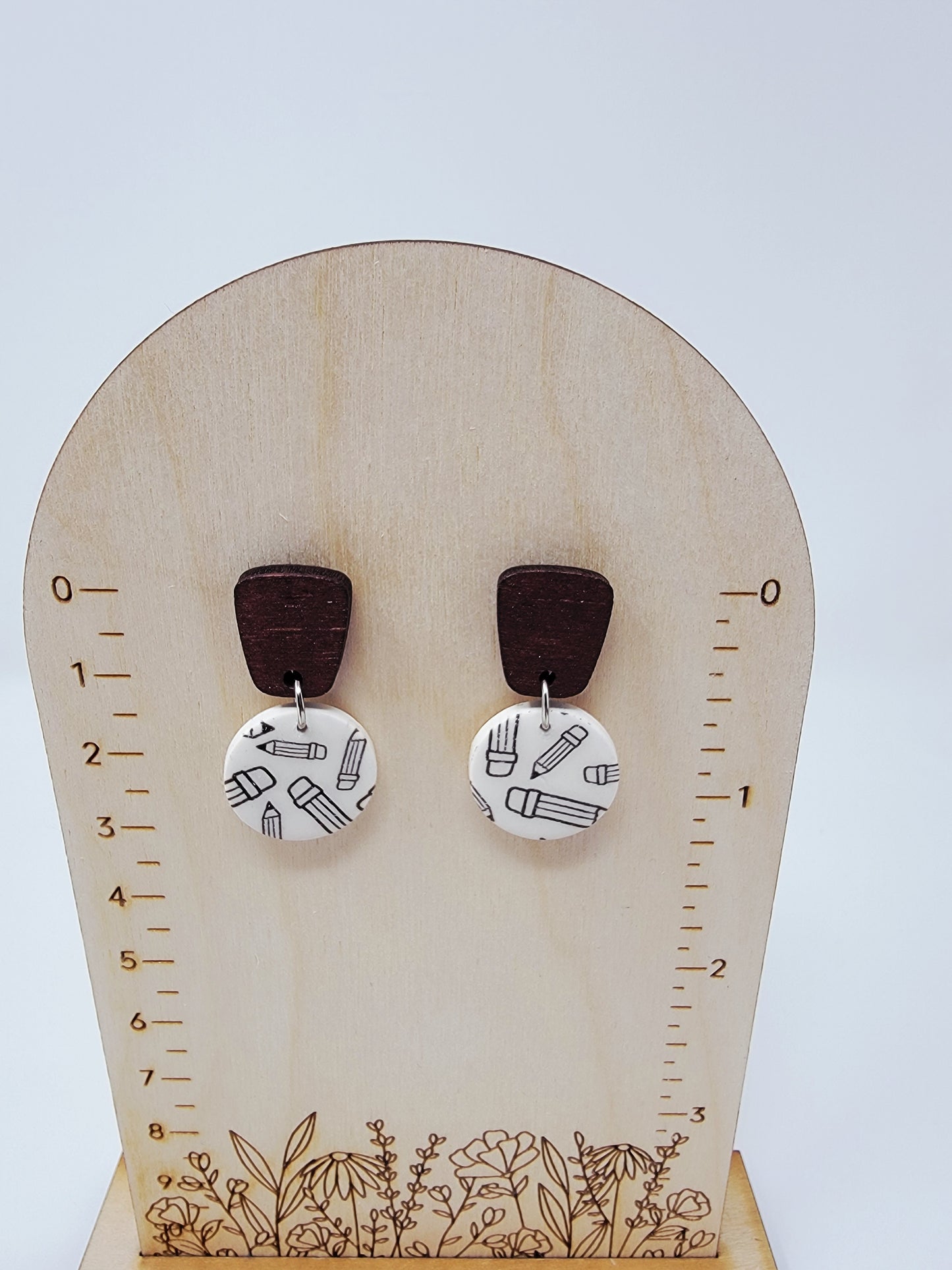 Pencil pattern dangles with wood top