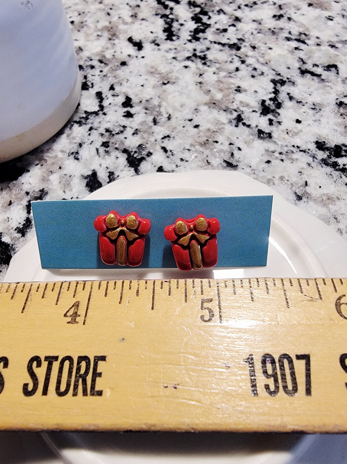 Red& gold painted present studs
