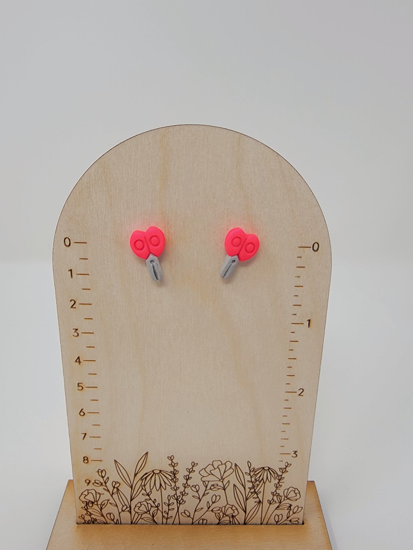 Fluorescent pink scissor studs