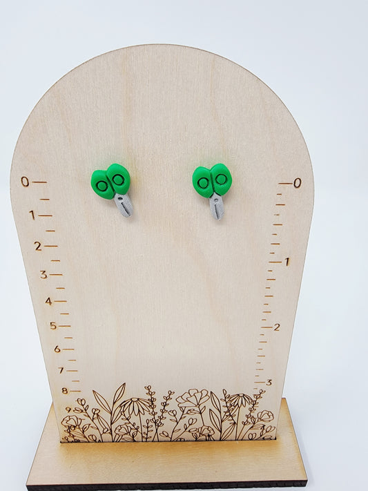 Green scissor studs