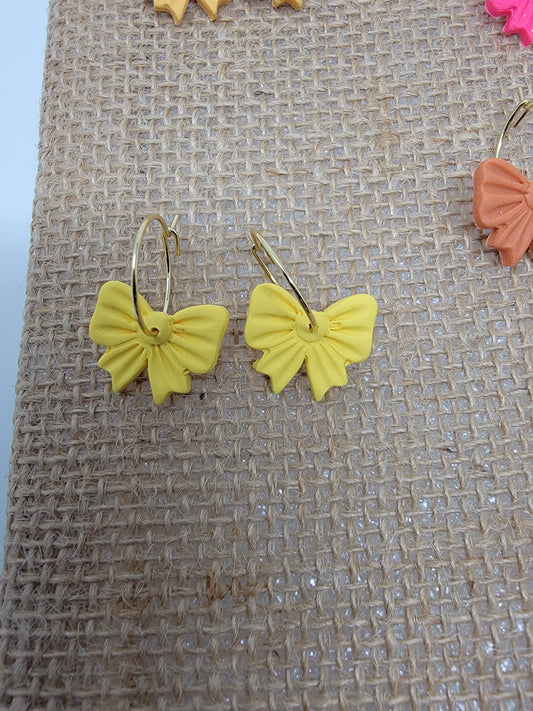 Yellow chunky bow gold hoops