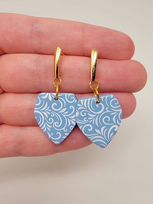 Blue and white dangles with gold accent top