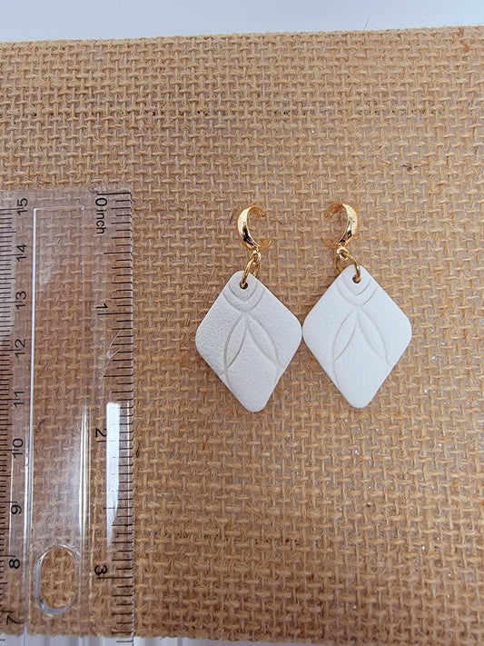 Everyday white dangles with gold top