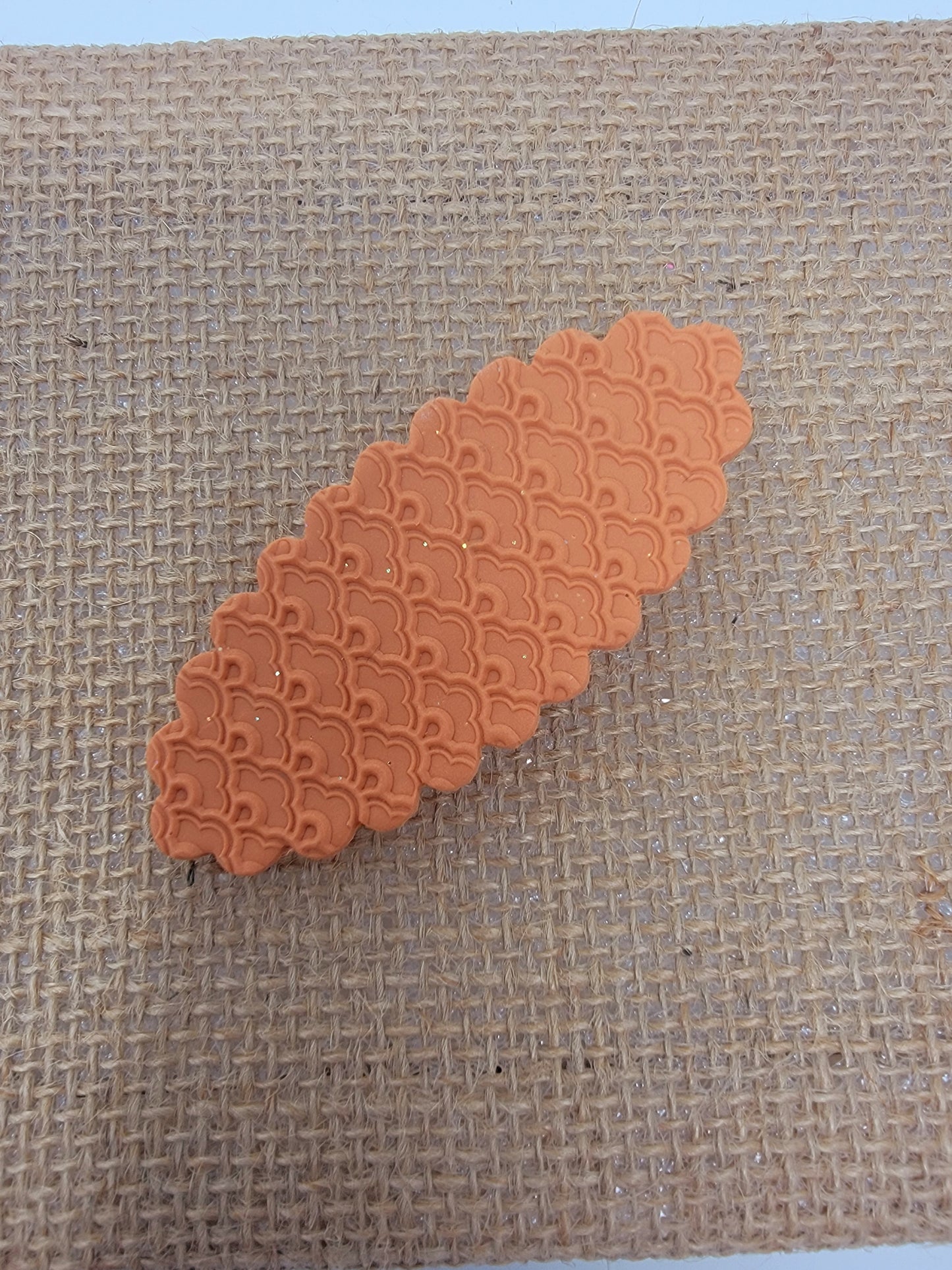 Textured orange 2.75 inch hairclip