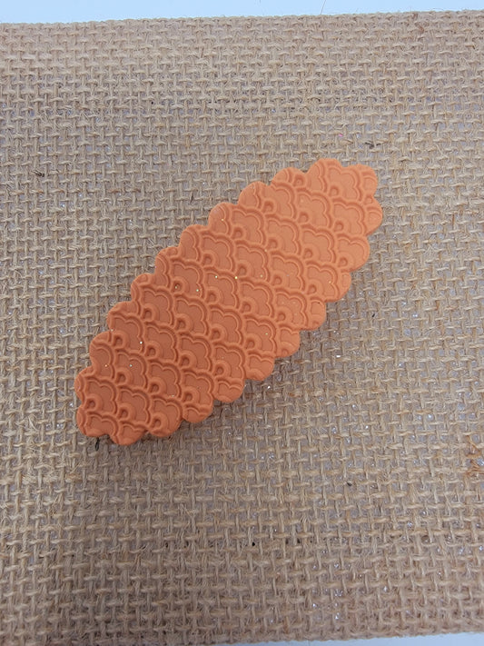 Textured orange 2.75 inch hairclip