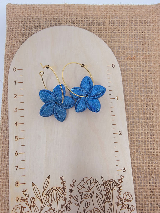 Glittery blue floral hoops