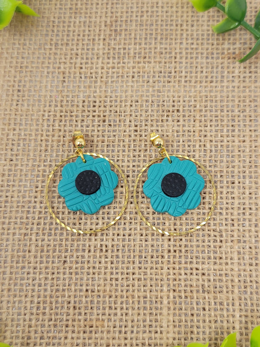 Dark teal floral dangles with brass hoop accent