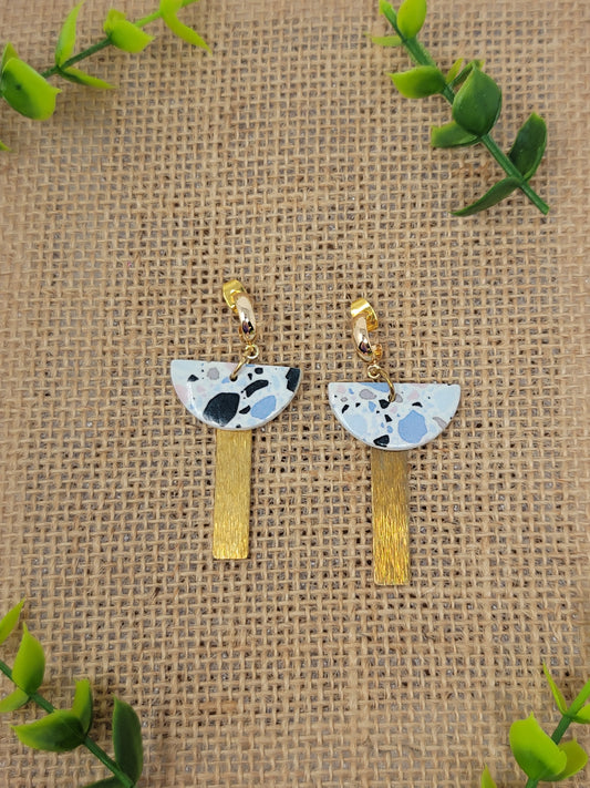 Terrazo pattern dangles with textured brass accent