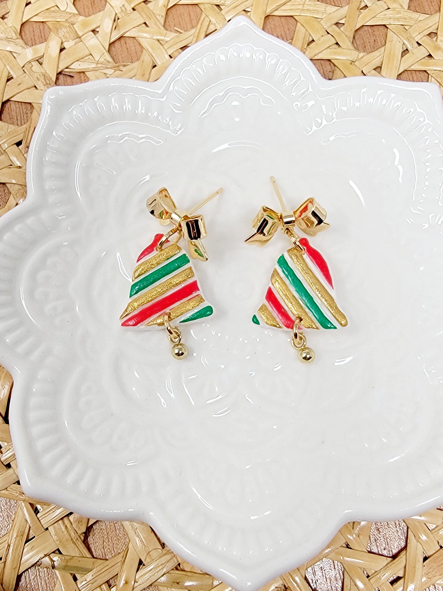 Multicolored bell dangles with bow top