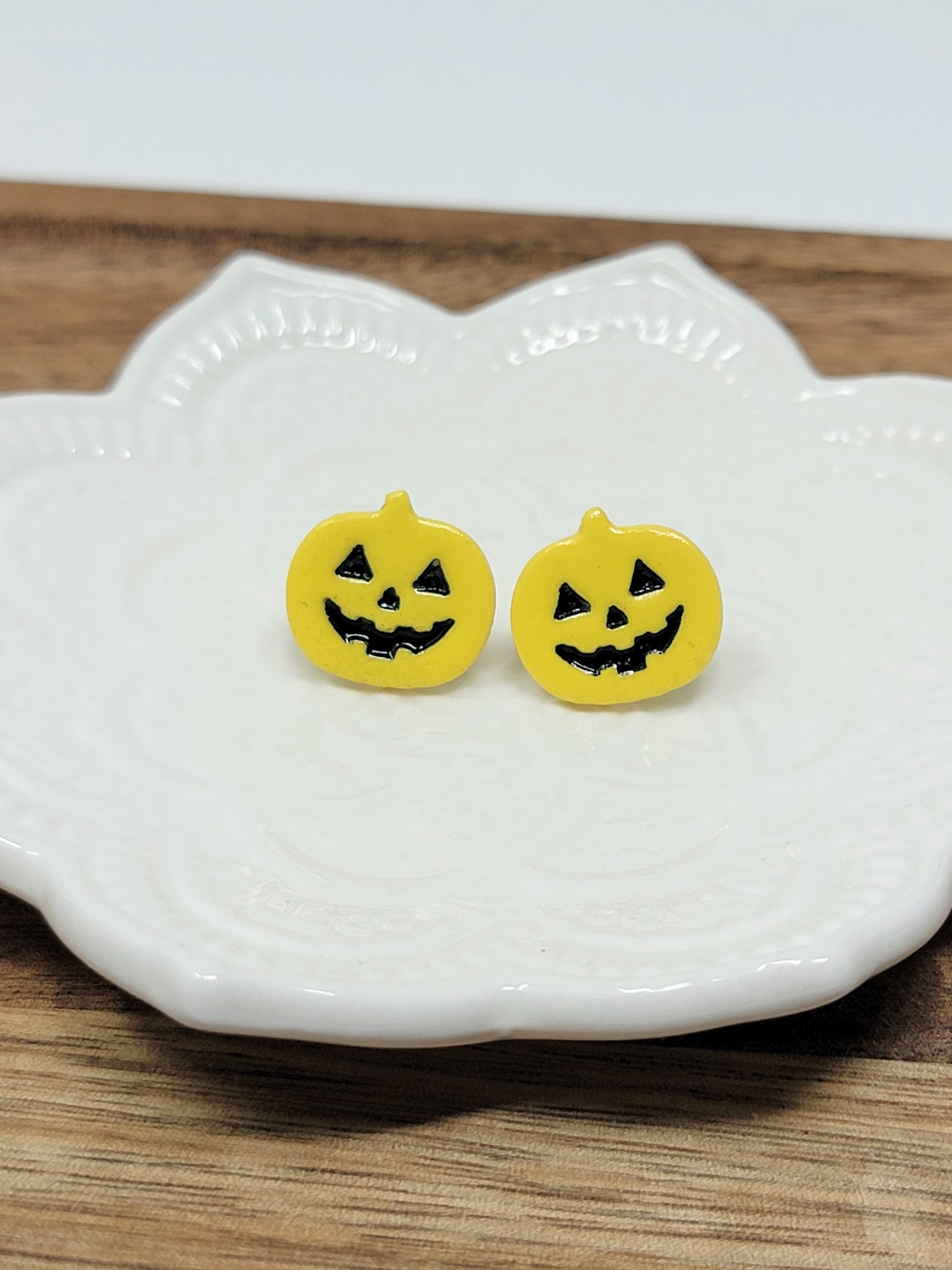 Yellow jack o'lantern studs