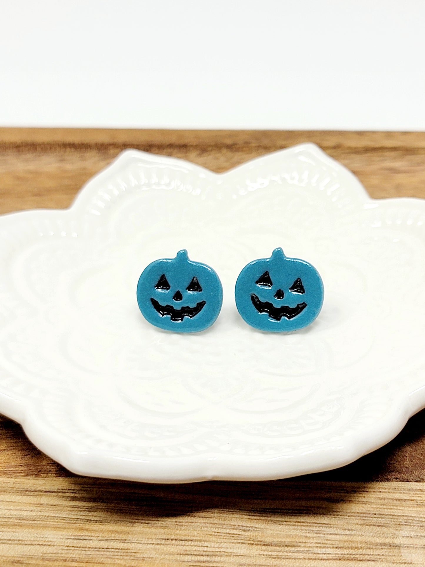 Blue jack o'lantern studs