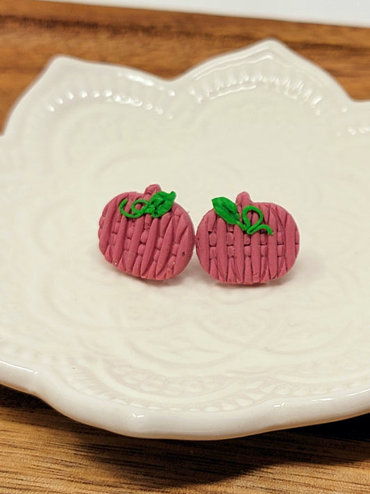 Textured pink pumpkin with leaves