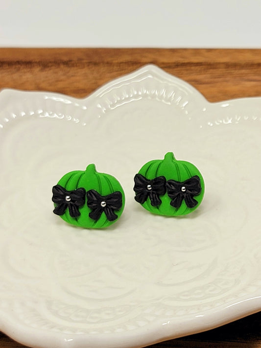 Green pumpkin black bow studs