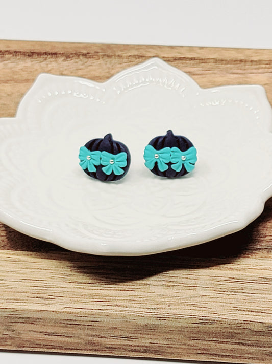 Navy pumpkin with blue bow studs