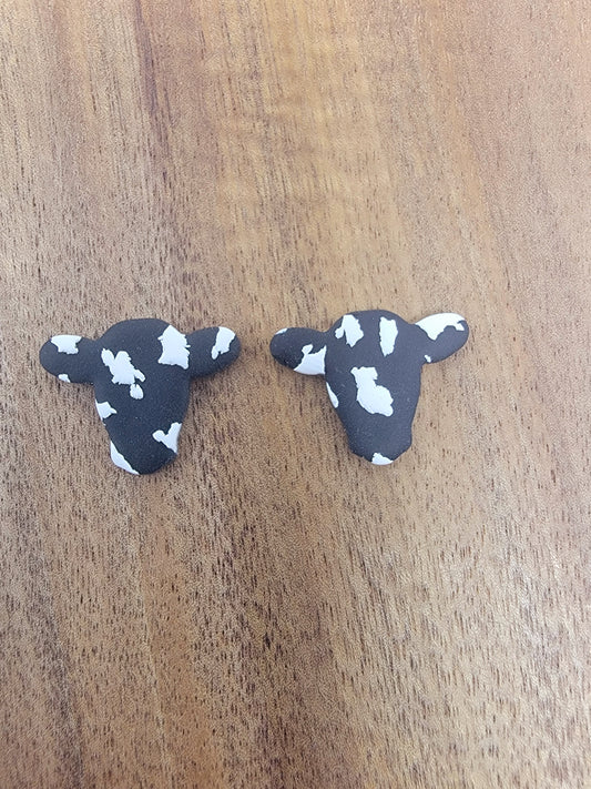 Black cow studs