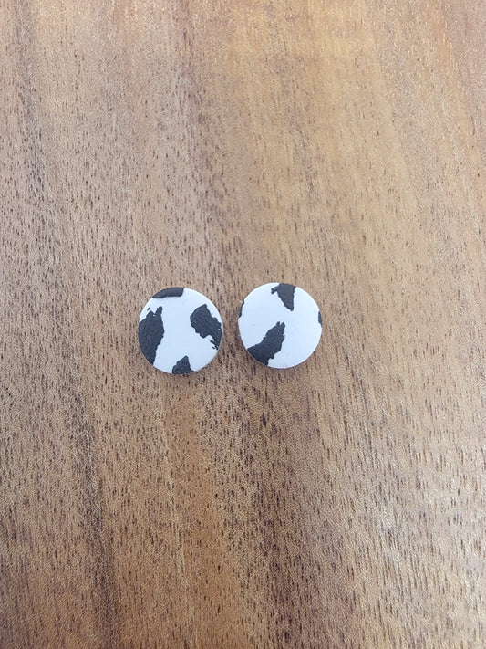 White cow print studs