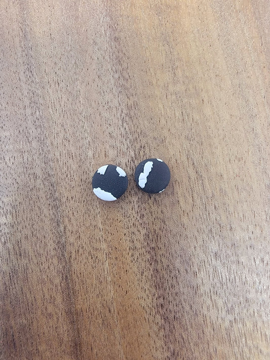 Mini black cow print studs