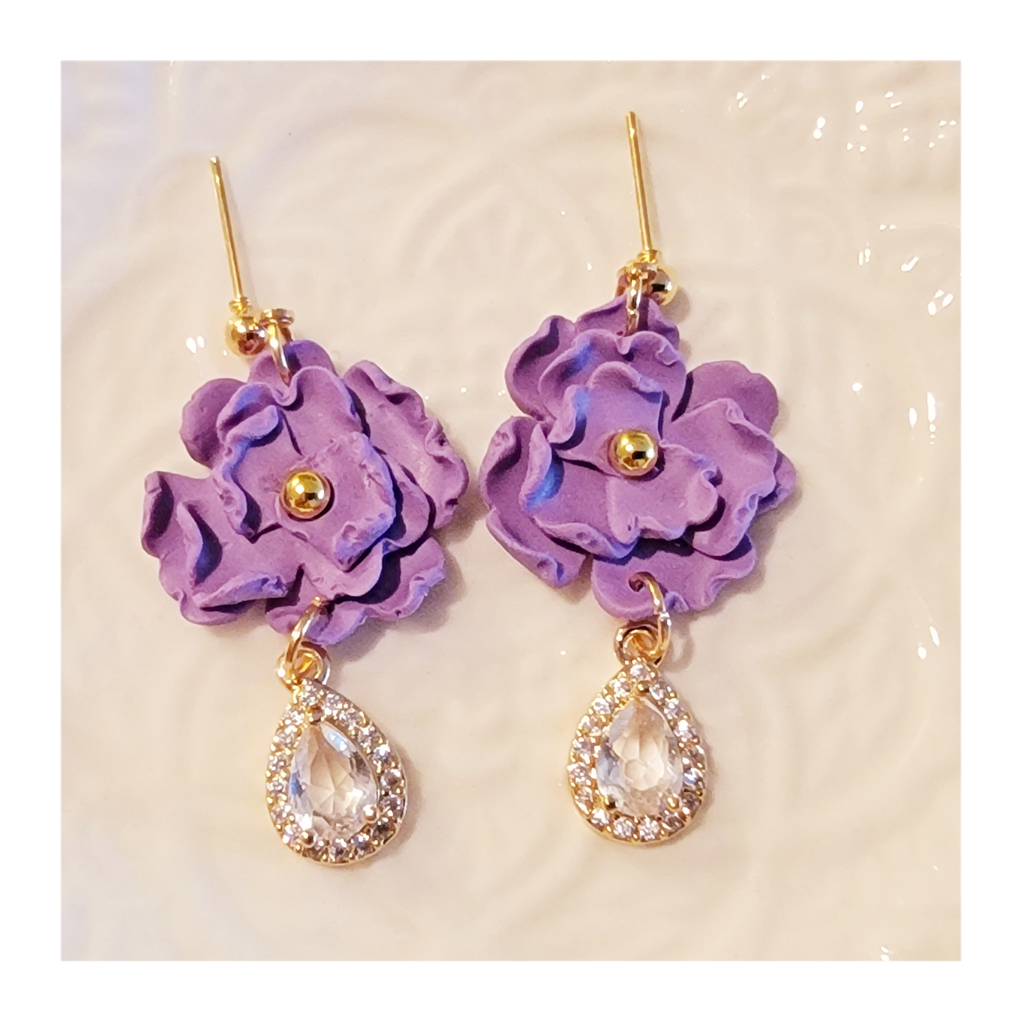 Purple hand shaped flower dangles