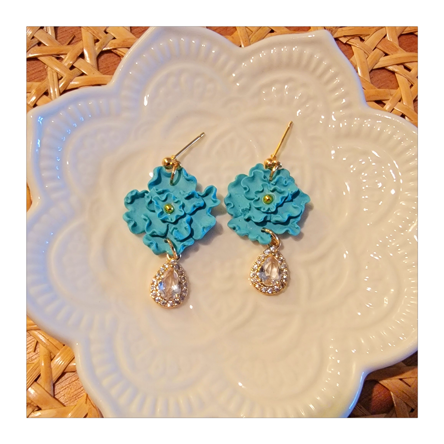 Light blue hand shaped flower dangles