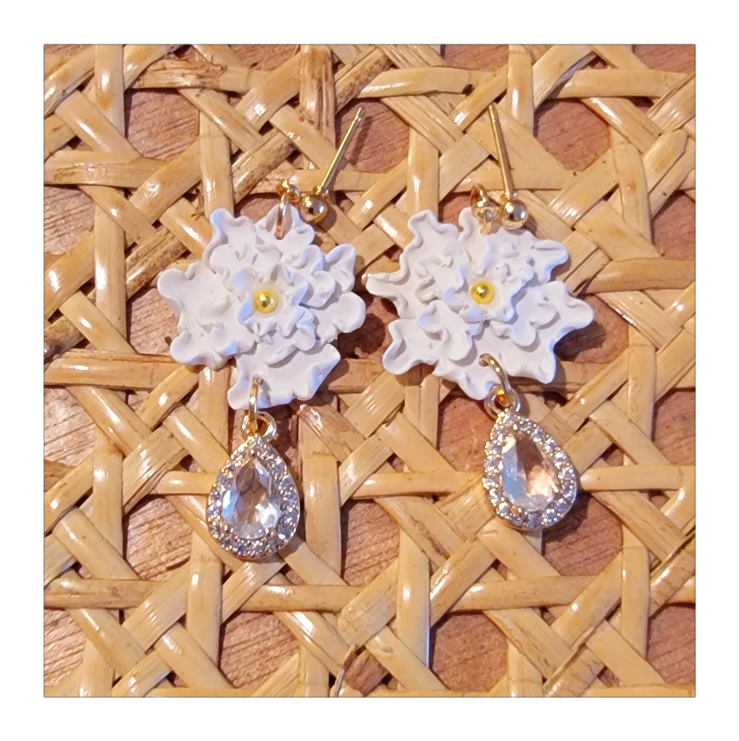 White hand shaped flower dangles